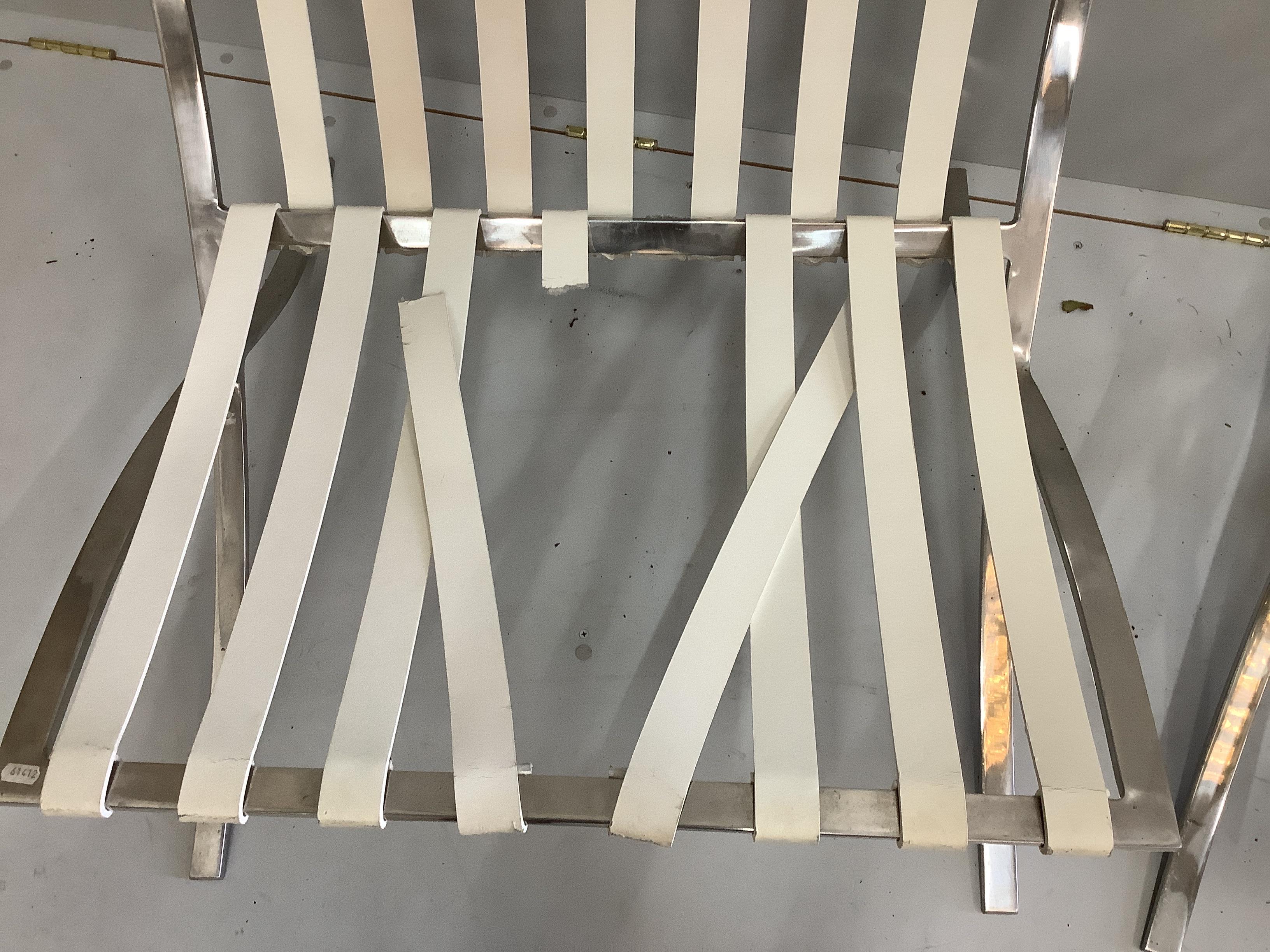 A pair of Barcelona style chrome and white leather chairs, width 78cm, depth 78cm, height 85cm